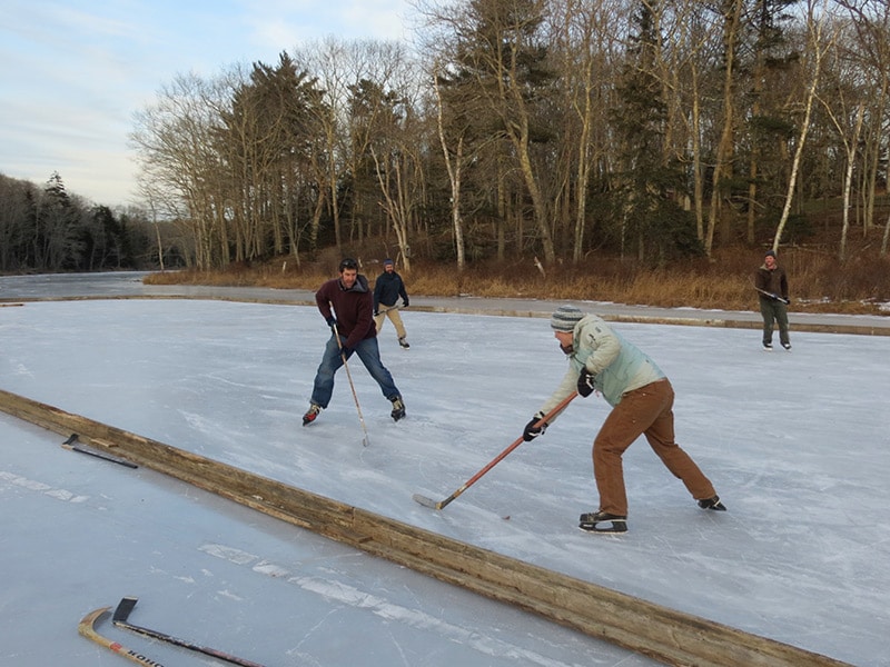 playing ice hockey on the pond